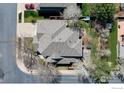 Aerial view of the home showcasing the roof, backyard with deck, and neighborhood streets at 4027 Guadeloupe St, Boulder, CO 80301