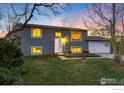 Traditional two-story home featuring a classic facade and inviting entrance at 4547 Ashfield Dr, Boulder, CO 80301