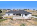 Aerial view of a single-story home with a neutral exterior and well-kept landscaping at 10071 E 142Nd Ave, Brighton, CO 80602