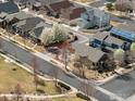 A neighborhood view showing nearby homes and the home's location in relation to the street and adjacent homes at 1433 Moonlight Dr, Longmont, CO 80504