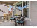 Cozy front porch with outdoor seating, perfect for relaxing at 1579 Hays Ct, Erie, CO 80516