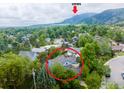 Aerial view showcases the property's location, mountain views, and surrounding neighborhood at 516 Valley View Dr, Boulder, CO 80304