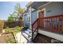 Beautiful home featuring a garden, stylish entryway, and a well-manicured lawn at 1605 17Th St, Boulder, CO 80302