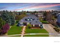 Aerial view of beautiful home, showcasing the manicured lawn and neighborhood at 2066 Ridgeview Way, Longmont, CO 80504