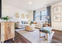 Inviting living room featuring stylish decor and a comfortable seating area at 4202 Sandstone Dr, Mead, CO 80504