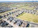 Beautiful overhead shot showing the property, neighborhood, and scenic mountain views in the distance at 17614 Cherokee St, Broomfield, CO 80023
