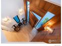Unique foyer with stunning wood detailing, modern lighting, and artistic design elements at 3633 21St St, Boulder, CO 80304