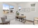 Bright home office with natural light and a simple, modern desk setup at 735 Discovery Pkwy, Superior, CO 80027