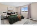 Cozy bedroom featuring a window and stylish decor at 1350 Josephine St # 502, Denver, CO 80206