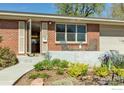 Inviting front porch with seating, perfect for relaxing and enjoying the neighborhood views at 195 S 35Th St, Boulder, CO 80305