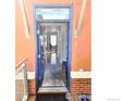 Charming entryway featuring a blue door and glimpses of a well-lit interior at 2336 Spruce St # 5, Boulder, CO 80302