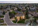 Aerial view of a quiet neighborhood showcasing well-maintained homes and lush greenery at 787 Niwot Ridge Ln, Lafayette, CO 80026