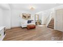Spacious living room features modern decor, hardwood floors, and a cozy atmosphere at 1485 Stoneham St, Superior, CO 80027
