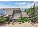 Lovely home featuring solar panels, a tiled roof, and a beautifully landscaped entrance and private yard at 36 High View Dr, Boulder, CO 80304