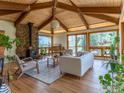 Bright living room featuring vaulted ceilings, wood burning stove, and comfortable seating at 2015 Kohler Dr, Boulder, CO 80305