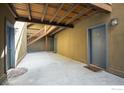 Condo exterior features unit entry, stairway, and overhead beams for a rustic and functional architectural touch at 2711 Mapleton Ave # 1, Boulder, CO 80304