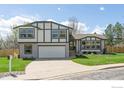 Charming home featuring a well-manicured lawn and a two-car garage at 4223 Peach Way, Boulder, CO 80301
