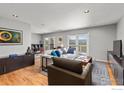 Inviting living room with hardwood floors, comfortable seating, and a seamless open floor plan at 1247 Westview Dr, Boulder, CO 80303