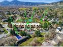 Aerial view shows community amenities, including pool, tennis courts and townhome complex at 3825 Northbrook Dr # F, Boulder, CO 80304
