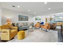Bright living room features modern furniture, neutral colors, and open floor plan at 3825 Northbrook Dr # F, Boulder, CO 80304
