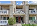 Multi-level condo building featuring private balconies and well-maintained landscaping at 4965 Twin Lakes Rd # 68, Boulder, CO 80301