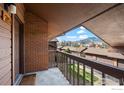Cozy balcony with view and brick wall at 501 Manhattan Dr # 202, Boulder, CO 80303