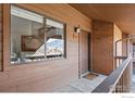 Exterior of a unit with wood and brick facade at 501 Manhattan Dr # 202, Boulder, CO 80303