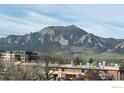 Scenic view of Boulder's iconic flatirons from the home's location at 501 Manhattan Dr # 202, Boulder, CO 80303