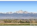 Expansive view featuring majestic snow-capped mountains in the distance at 6021 Sandstone Cir, Erie, CO 80516