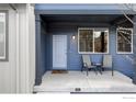 Inviting front porch featuring comfortable seating and a welcoming entrance at 11488 E 25Th Dr, Aurora, CO 80010