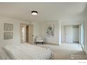 Bright main bedroom with neutral tones and ample closet space at 1496 Greenbriar Blvd, Boulder, CO 80305