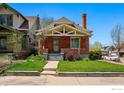 Charming brick home with a welcoming walkway, grassy lawn, and quaint architectural details at 3059 N York St, Denver, CO 80205