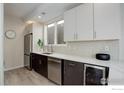 Contemporary kitchen showcases stainless steel appliances, sleek cabinetry, and quartz countertops at 726 Pearl St # B, Boulder, CO 80302