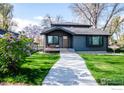 Charming facade with a inviting pathway and a cozy porch at 7800 Hygiene Rd, Longmont, CO 80503