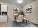 Cozy dining area with seating for four and modern decor at 1094 S Dearborn St # 301, Aurora, CO 80012
