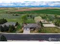 Neighborhood view featuring single Gathering homes with well-kept lawns and recreational areas at 11669 Montgomery Cir, Longmont, CO 80504