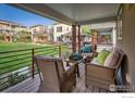 View from relaxing porch featuring comfortable seating, stylish pillows and outdoor views at 1231 Cedar Ave, Boulder, CO 80304