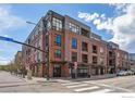 Corner view of an urban building at a city intersection featuring street view at 1360 Walnut St # 211, Boulder, CO 80302