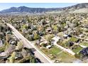 Enjoy stunning mountain views from this property nestled in a vibrant neighborhood with mature trees at 1891 Orchard Ave, Boulder, CO 80304