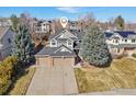 Two-story home featuring mature trees and three-car garage at 520 Campo Way, Superior, CO 80027