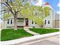 Charming home exterior with lush green lawn and inviting walkway to the front door at 1203 6Th St # 1203, Golden, CO 80403