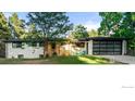 Charming exterior of a single-story home with a well-maintained lawn and modern design at 1920 S Niagara St, Denver, CO 80224