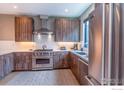 Modern kitchen featuring stainless steel appliances, ample cabinet space, and plenty of natural light at 2465 Walnut St # 7, Boulder, CO 80302