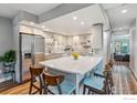 Bright kitchen with stainless steel appliances and a large island at 2950 Glenwood Dr, Boulder, CO 80301