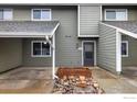 Charming townhome features a covered entry and low maintenance landscaping with convenient parking at 2976 Eagle Way, Boulder, CO 80301