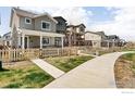 Charming street view showcasing well-maintained homes with inviting front yards and sidewalks at 320 Marshall Mews, Superior, CO 80027