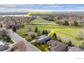Property aerial view showing proximity to Wankea Lake, ideal for nature enthusiasts and outdoor activities at 2330 Sandpiper Dr, Lafayette, CO 80026