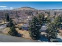 Single-Gathering home with mature trees and mountain views at 2605 Crabapple Ct, Golden, CO 80401