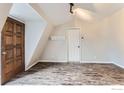 Bright, empty bedroom space ready for decor, enhanced with wood-style flooring and natural light at 387 Millionaire E Dr, Boulder, CO 80302