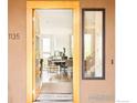 Inviting entryway with an open door showcasing a glimpse of the home's interior at 1135 Redwood Ave, Boulder, CO 80304